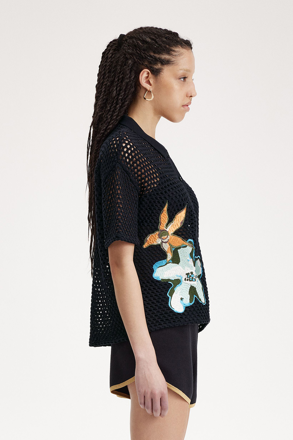 Amy Winehouse modelling her Fred Perry collaboration in 2010